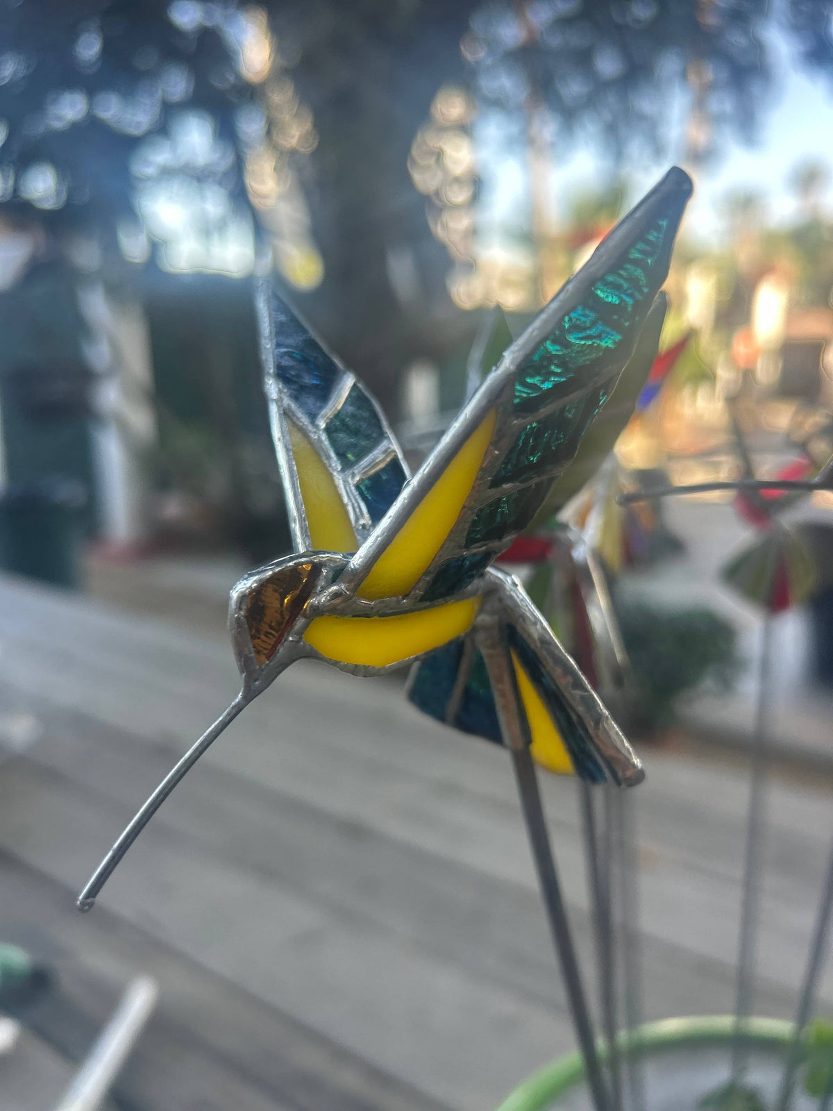 Stained glass stars and Talavera - Handmade Stained Glass Hummingbird Plant Stakes




With Rod