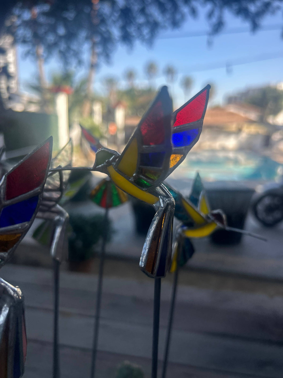 Stained glass stars and Talavera - Handmade Stained Glass Hummingbird Plant Stakes




With Rod