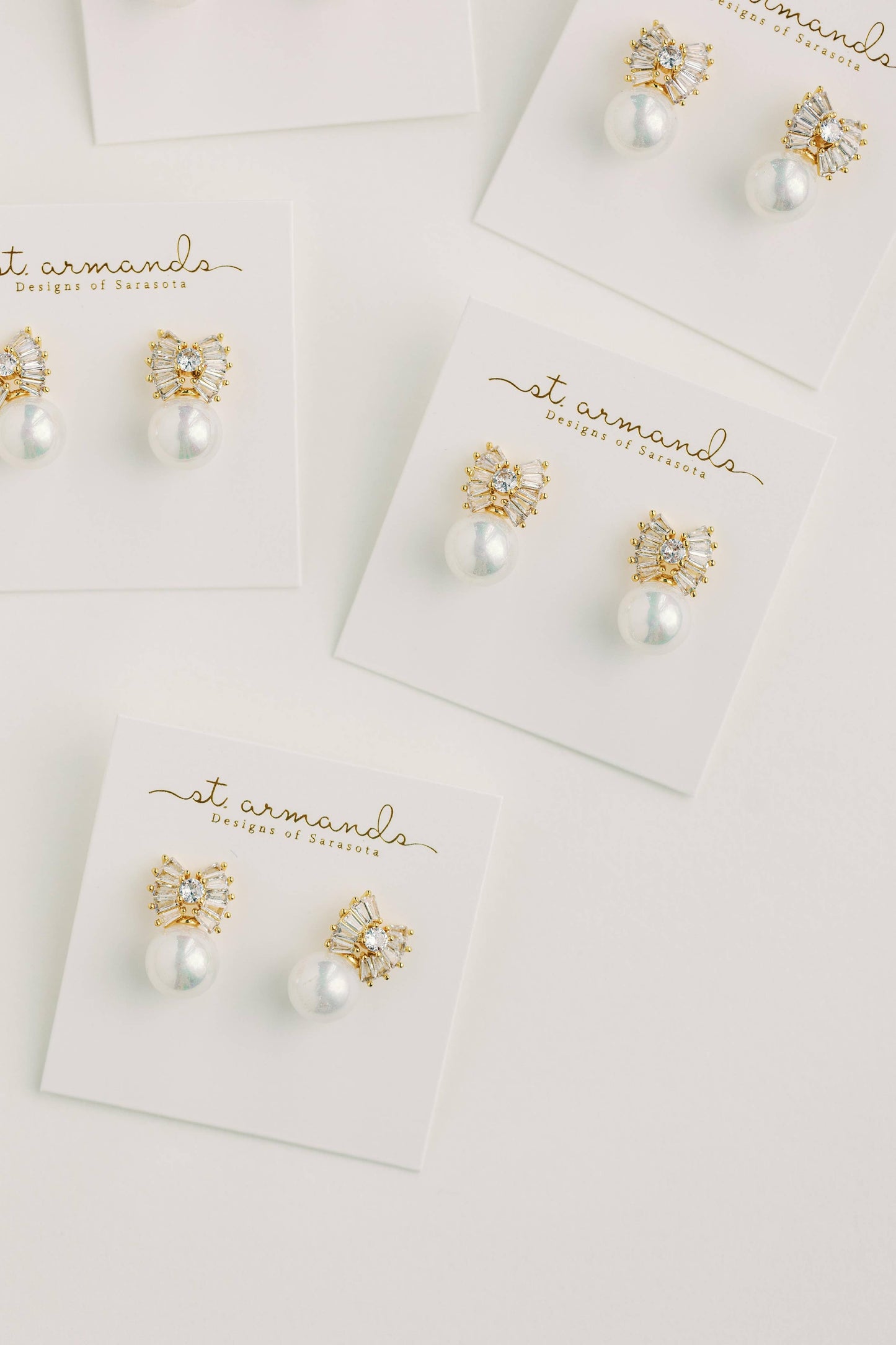 St Armands Designs of Sarasota - Gold Pearl Sparkler Statement Bow Earrings