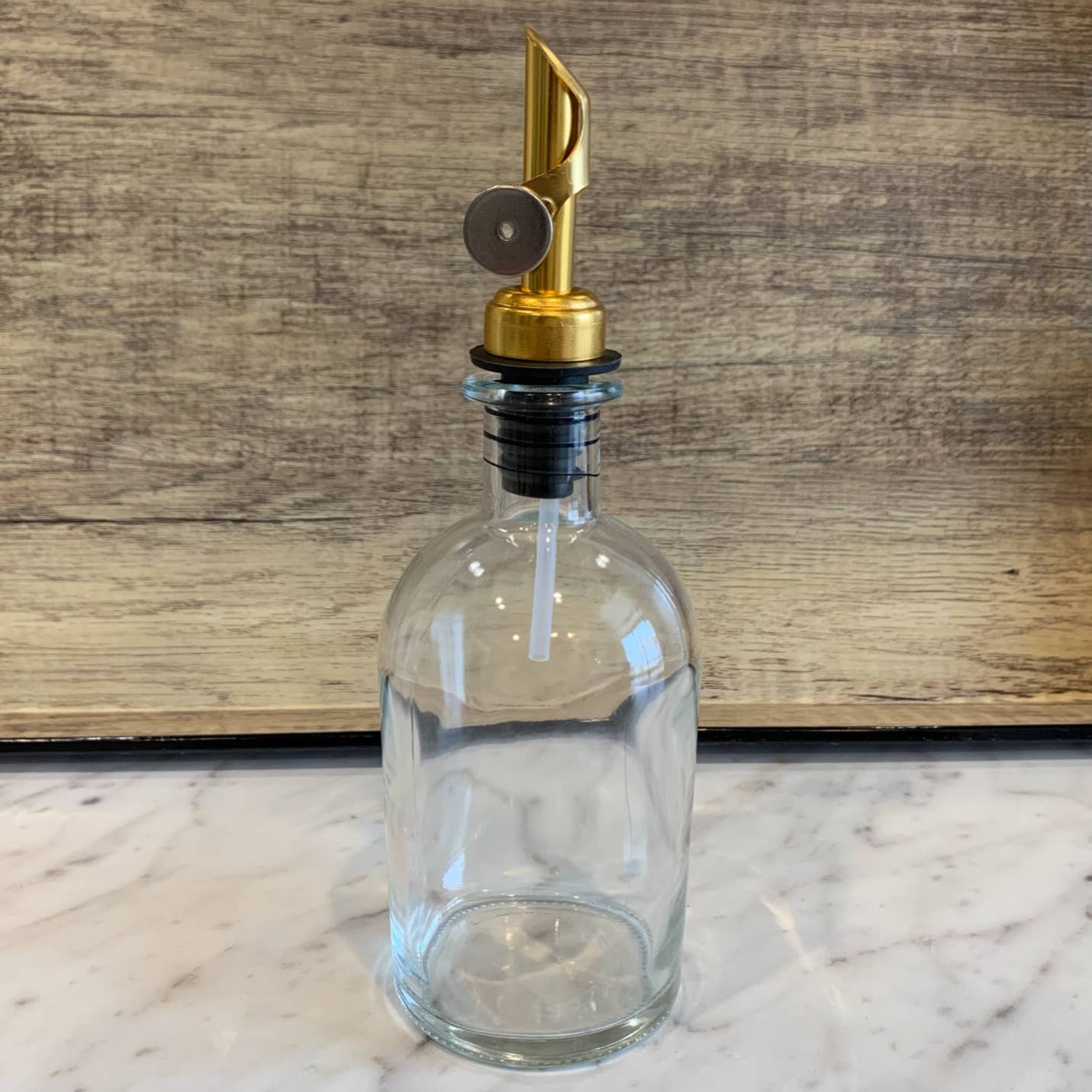 The Bottle Shoppe - 8 oz. Apothecary Clear Glass Bottle with Pour Spout: Gold Cork