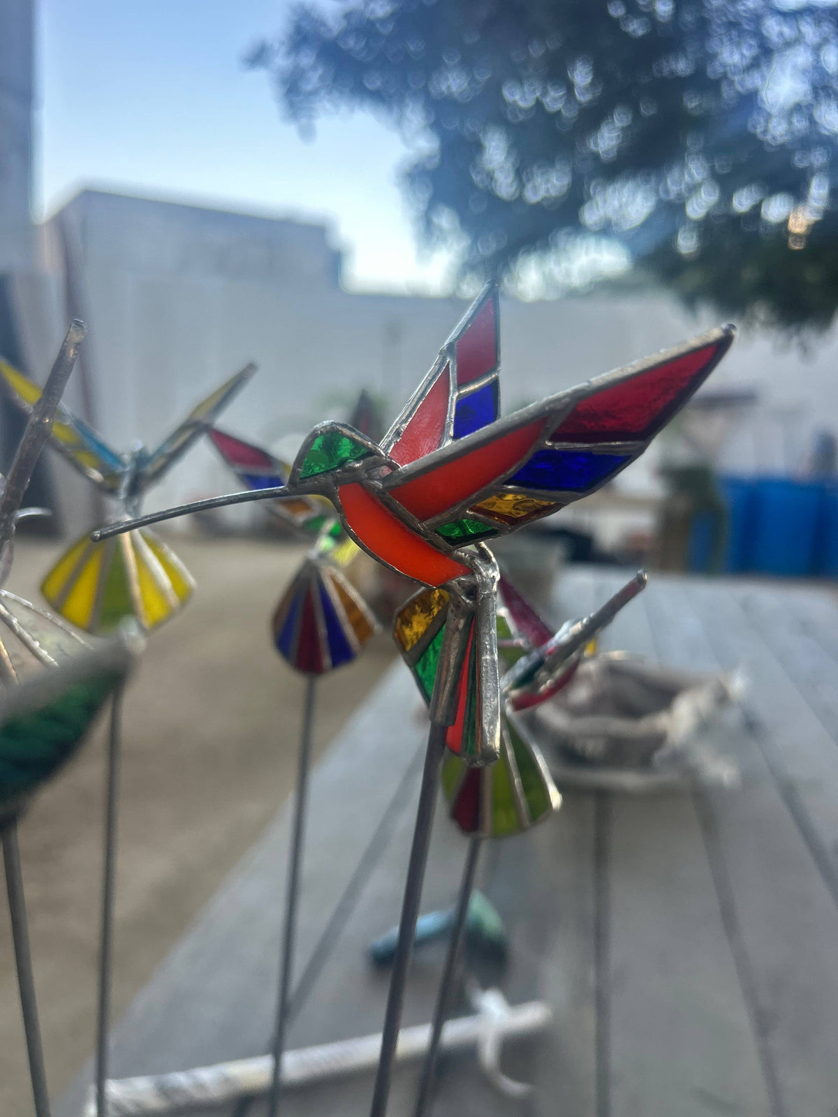 Stained glass stars and Talavera - Handmade Stained Glass Hummingbird Plant Stakes




With Rod