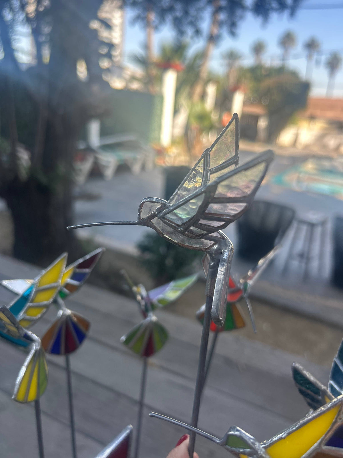Stained glass stars and Talavera - Handmade Stained Glass Hummingbird Plant Stakes




With Rod