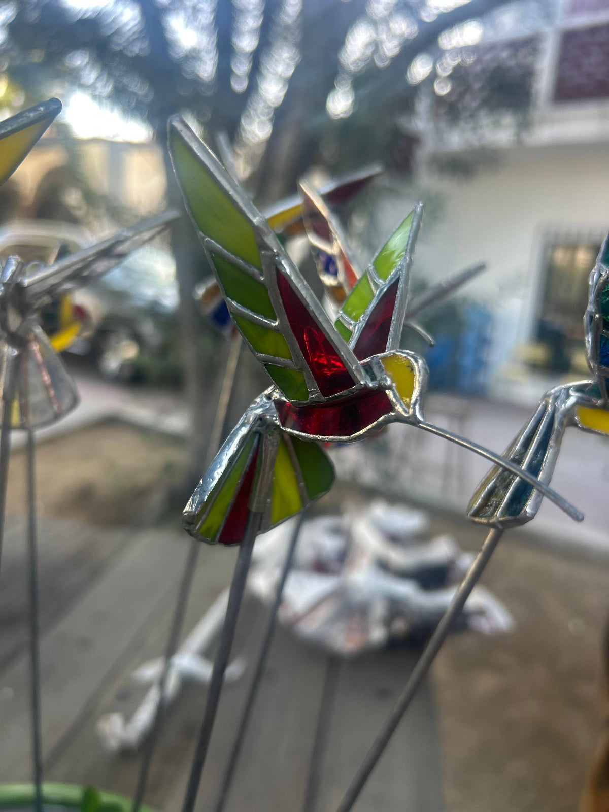 Stained glass stars and Talavera - Handmade Stained Glass Hummingbird Plant Stakes




With Rod