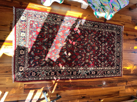 Vintage rug rust with teal