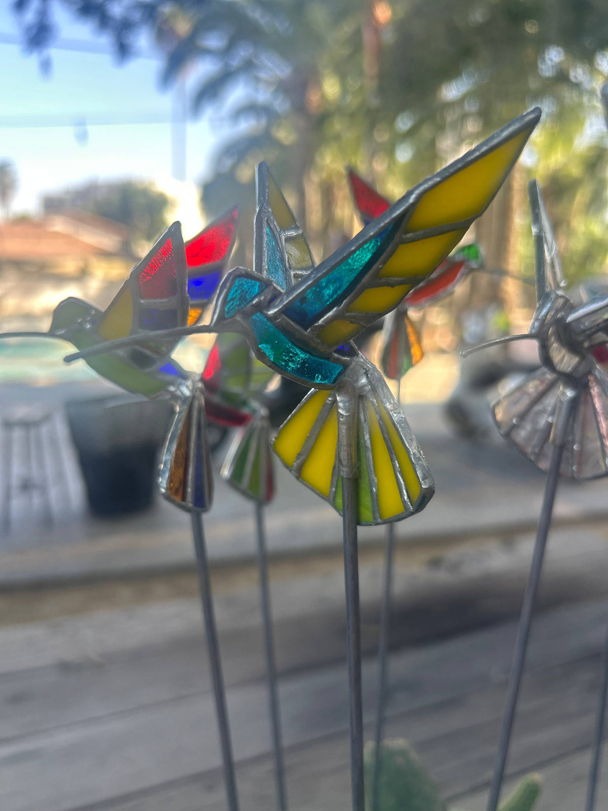 Stained glass stars and Talavera - Handmade Stained Glass Hummingbird Plant Stakes




With Rod