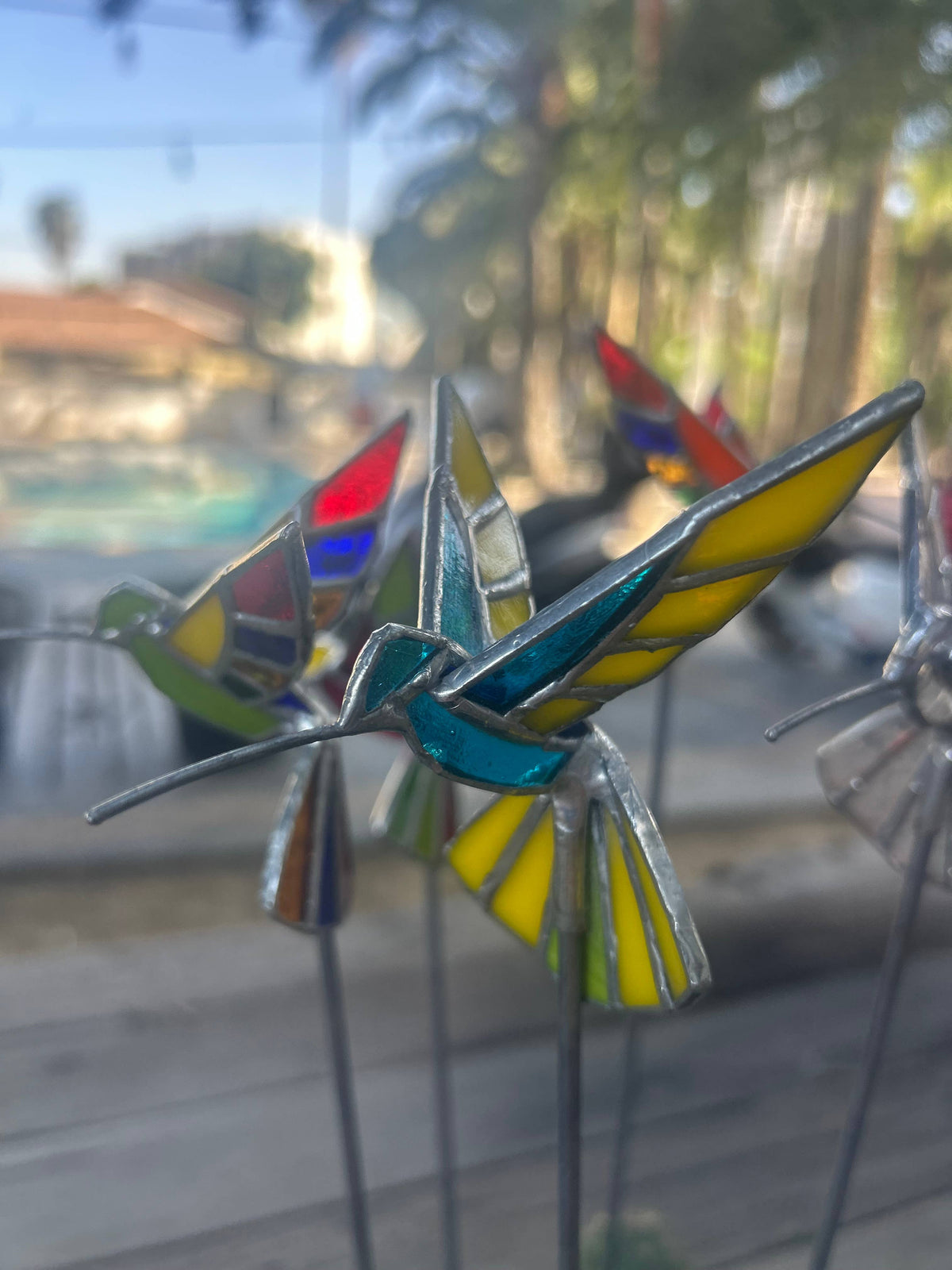 Stained glass stars and Talavera - Handmade Stained Glass Hummingbird Plant Stakes




With Rod