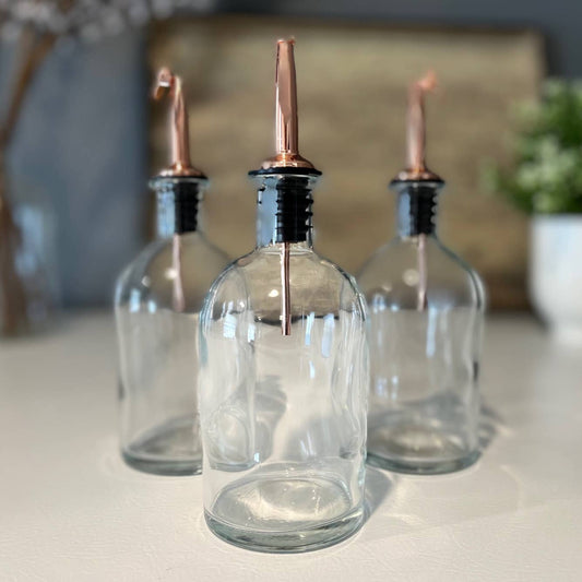 The Bottle Shoppe - 8 oz. Apothecary Clear Glass Bottle with Pour Spout: Gold Cork